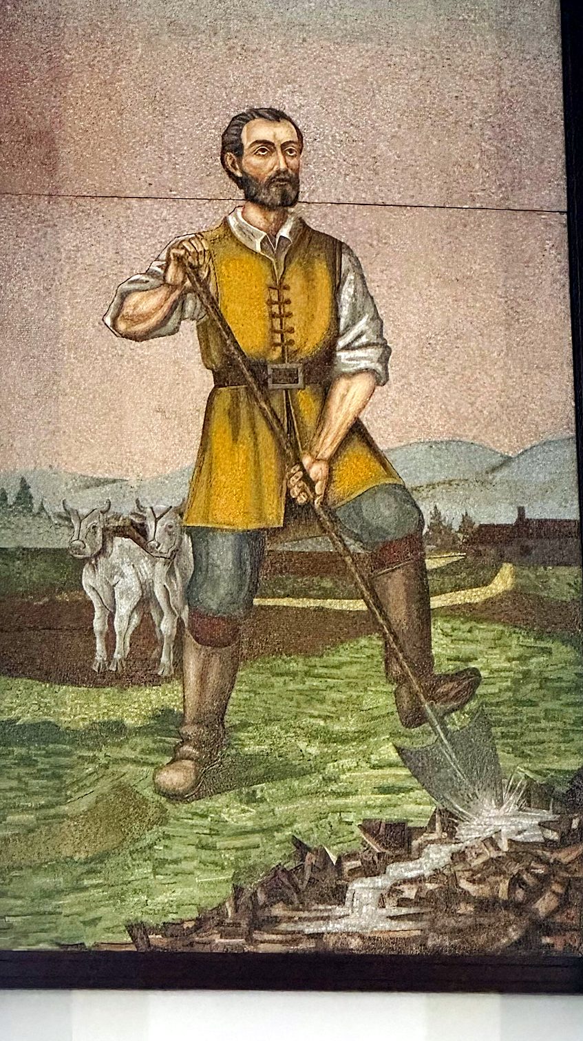 Um mosaico de San Isidro Labrador na igreja do centro de San Isidro